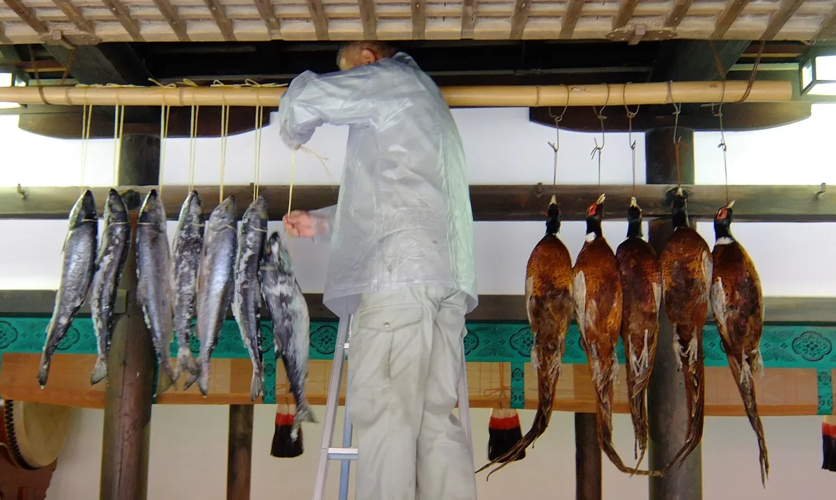 Salted salmon and pheasants hung as offerings for the Kasuga Wakamiya On-matsuri in Nara