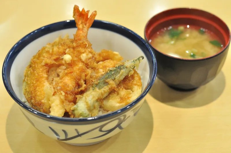 Tendon: shrimp and vegetable tempura on a bowl of rice, served with a cup of miso soup