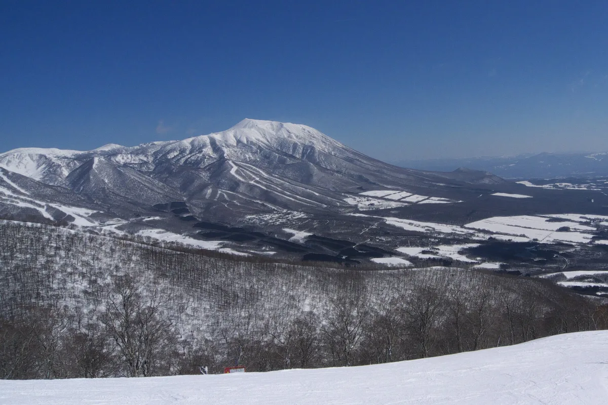 Snow-covered Mount Iwate and Mount Kurakake seen from Shizukuishi Ski Area
