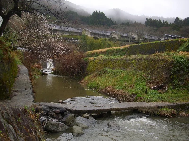 A low-water bridge crosses the Asuka River in the rural Oku Asuka landscape