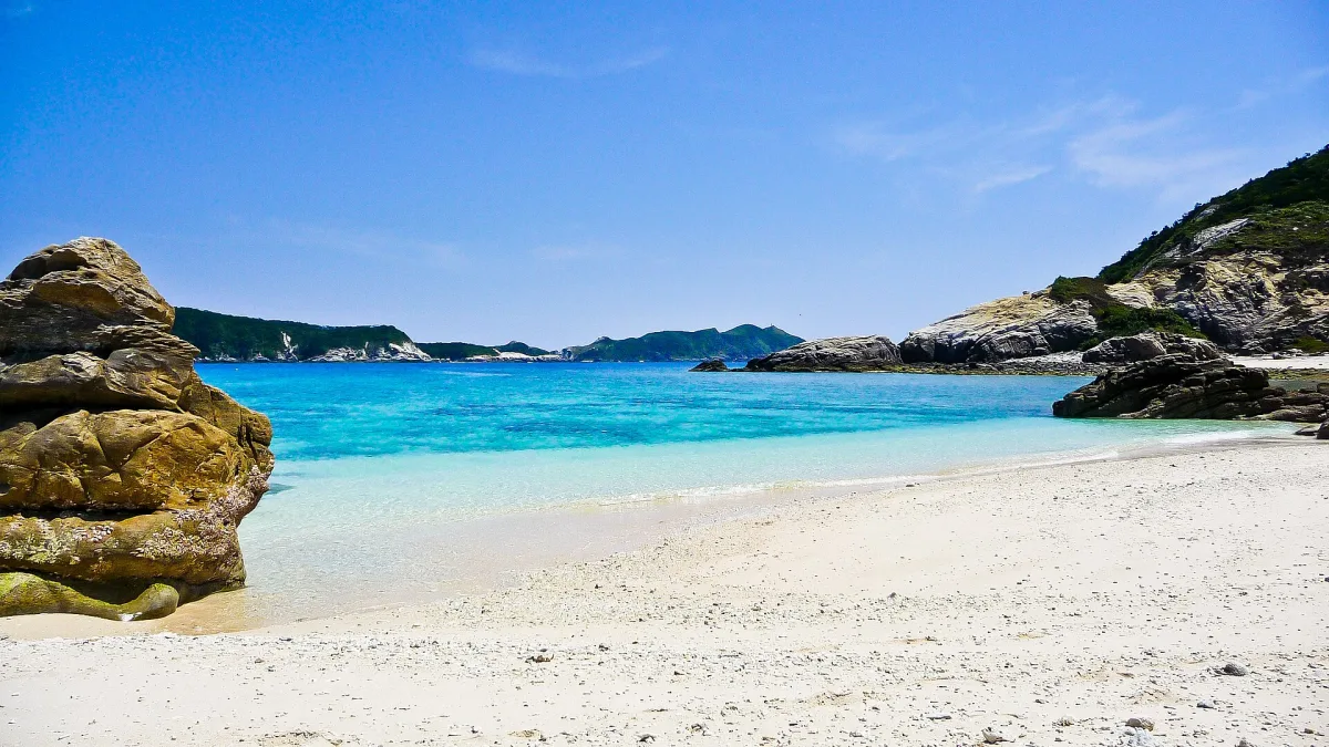White sand beach and clear turquoise water in the Kerama Islands