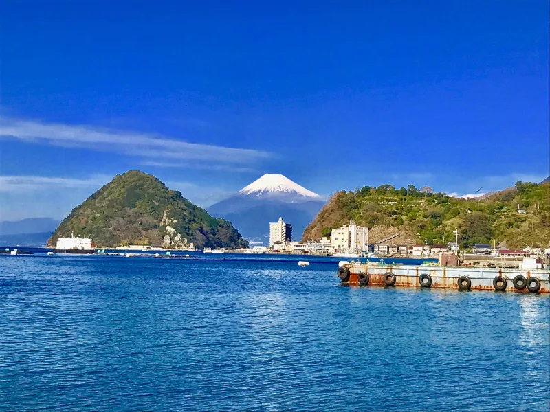 Mount Fuji rising behind Awashima Island on the coast of Shizuoka