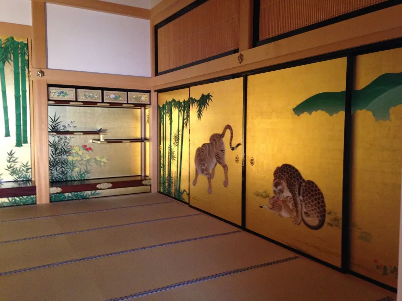 Gold sliding-door paintings of tigers inside the rebuilt Honmaru Palace
