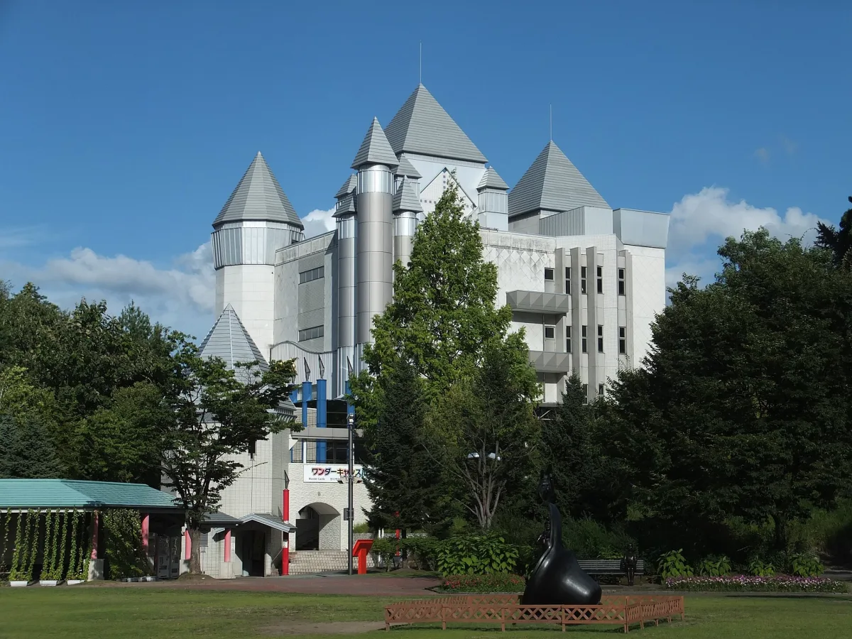 White castle-style Wonder Castle building with pointed towers at Akita Furusato Mura