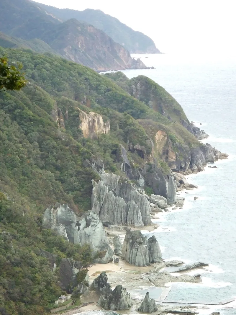 The pale sculpted cliffs of Hotokegaura rising above the coast