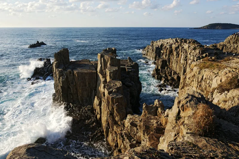 Waves breaking against the columnar rock pillars of Tojinbo on the Sea of Japan