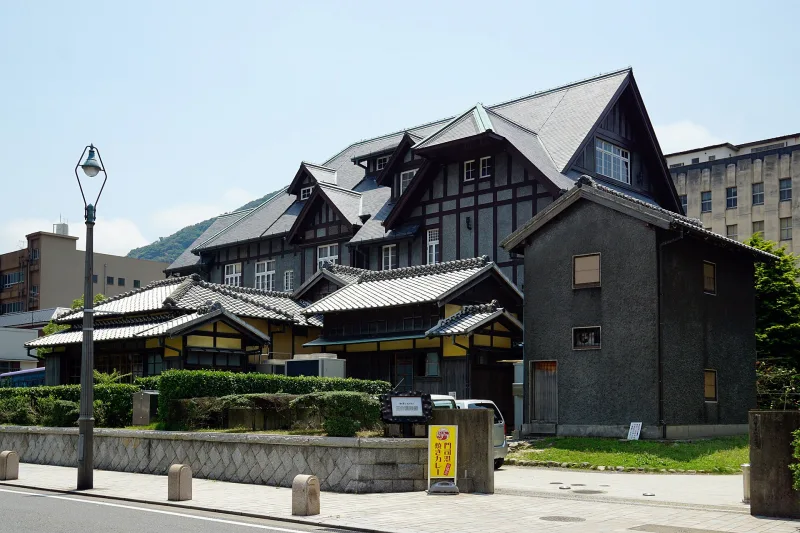 Half-timbered Western-style Former Moji Mitsui Club building beside a street in Mojiko