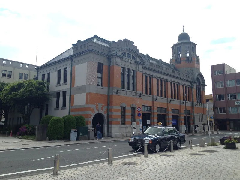 Former Osaka Shosen building in Mojiko with orange brick walls and an octagonal domed tower