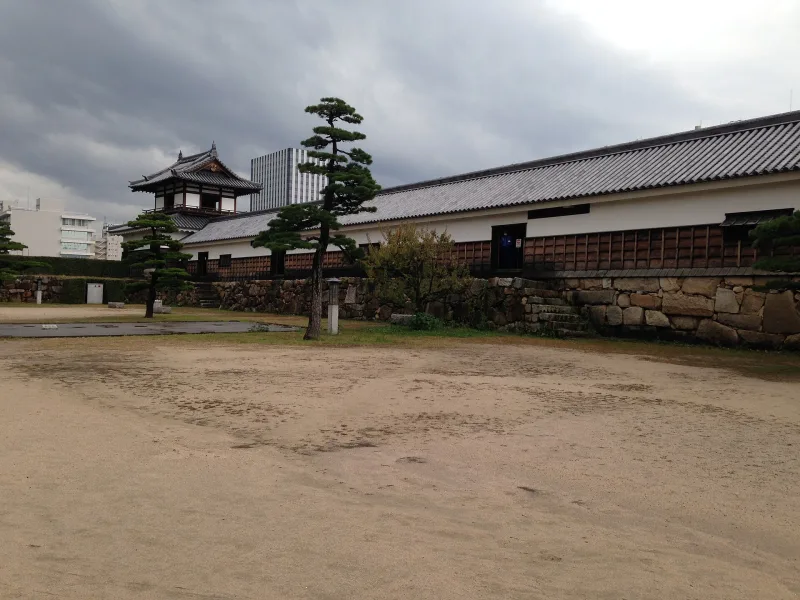Reconstructed wooden turrets and long walls of the Ninomaru enclosure at Hiroshima Castle