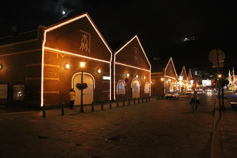 Kanemori brick warehouses outlined with lights at night