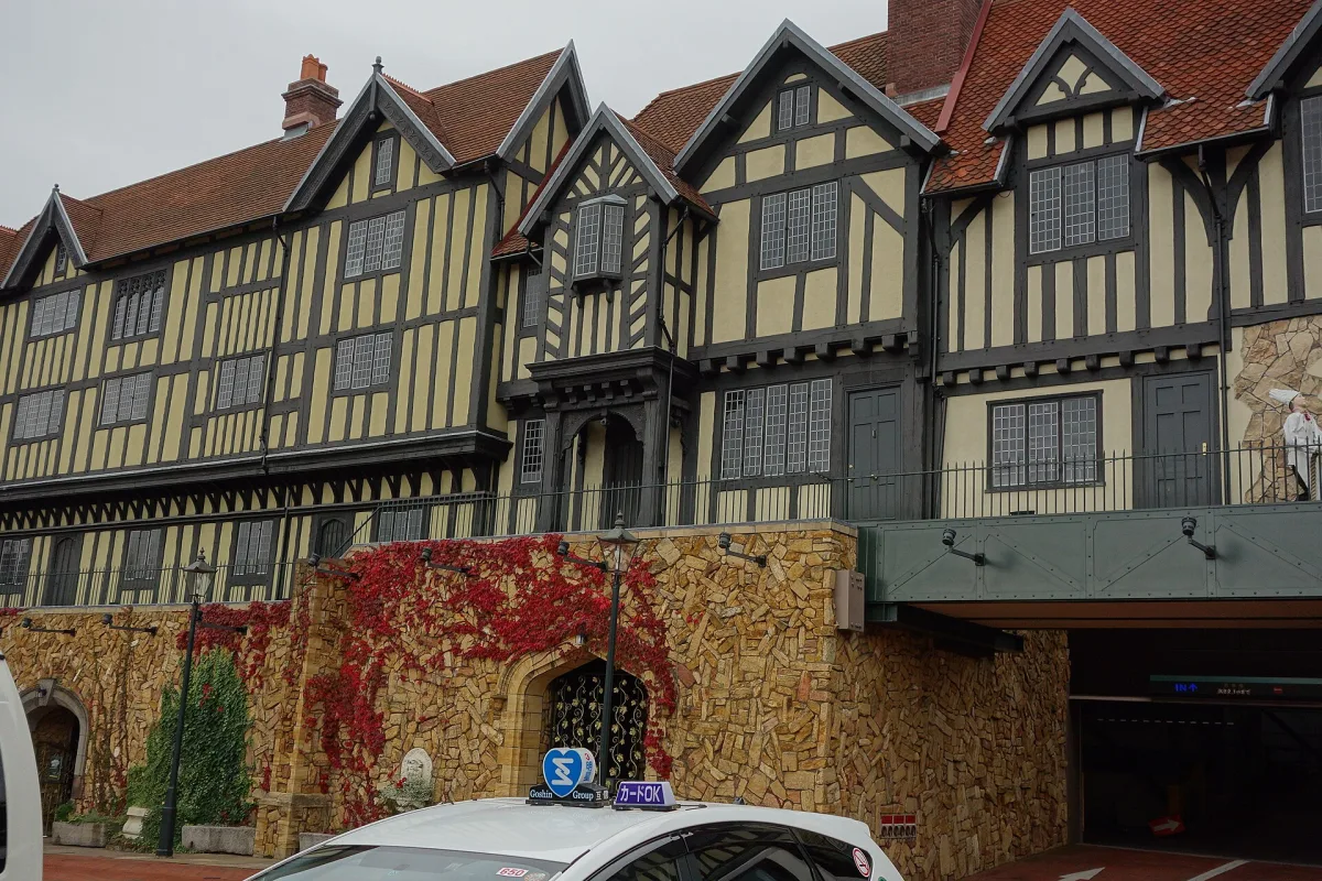 Tudor-style half-timbered buildings of Shiroi Koibito Park with red ivy on the walls