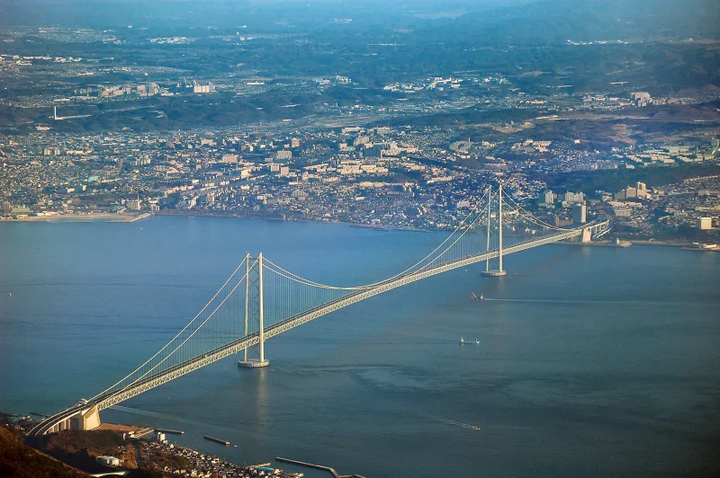 Aerial view of the Akashi Kaikyo Bridge crossing the strait