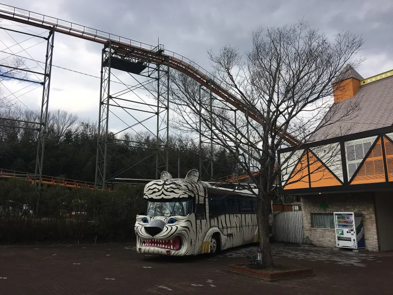 Safari bus painted with a zebra face at Himeji Central Park