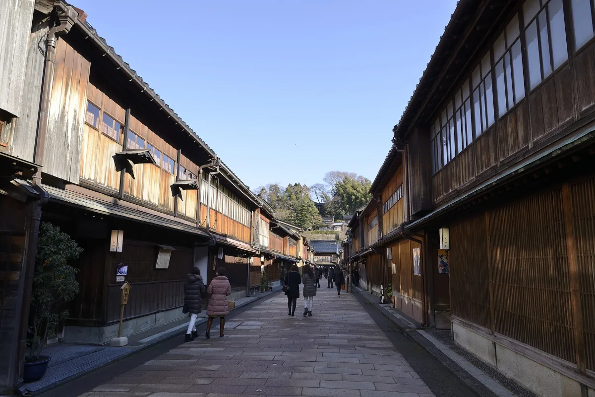 Stone-paved main street of Higashi Chaya District lined with wooden latticed teahouses