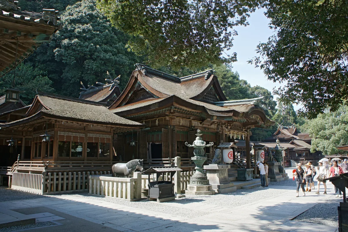 Wooden shrine halls with curved roofs at Kotohira-gu on the mountainside