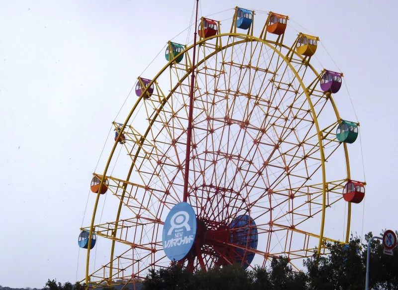 Large yellow Ferris wheel with colourful gondolas at NEW Reoma World