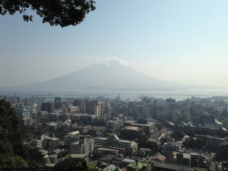 Kagoshima city and Sakurajima seen from the top of Shiroyama on a hazy day