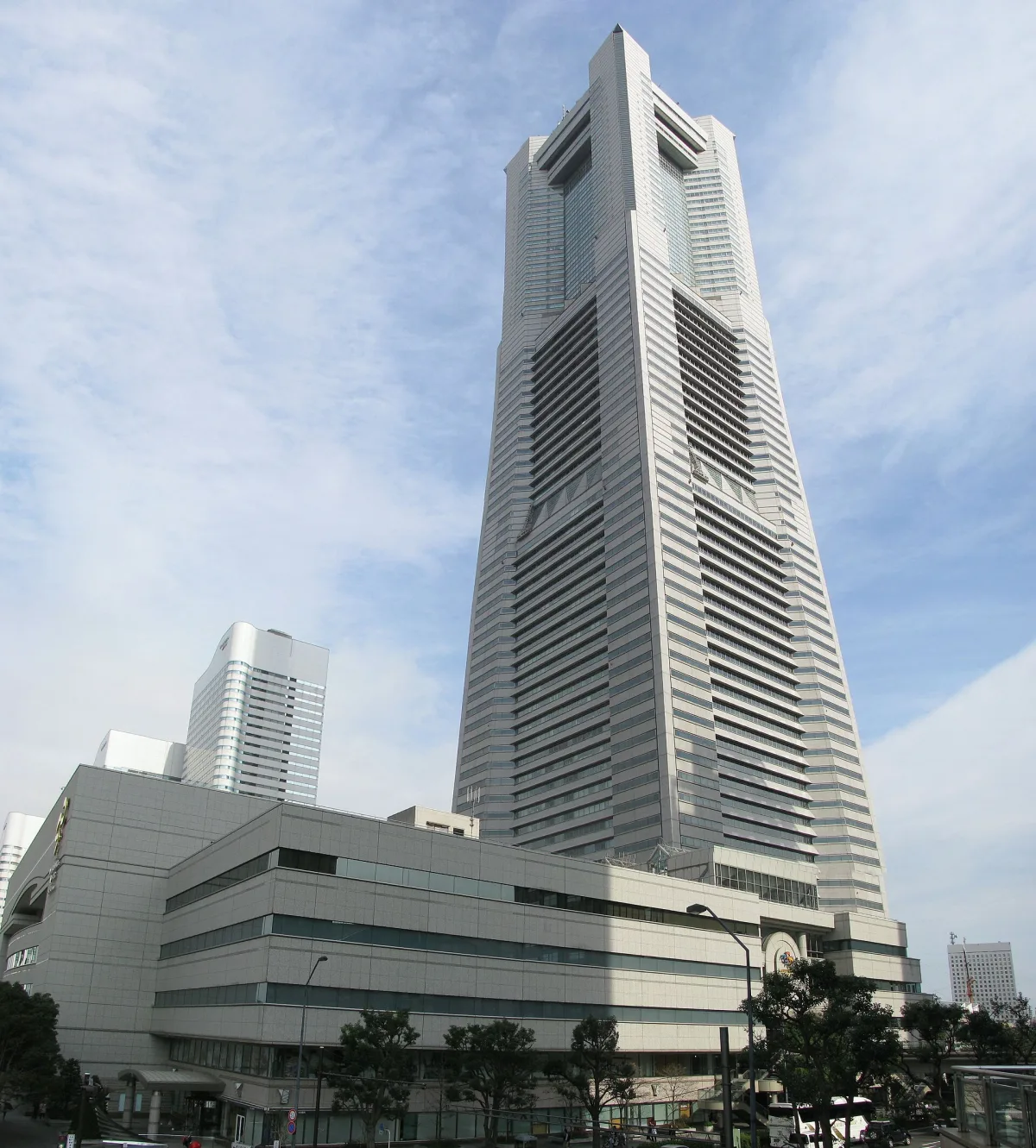 Yokohama Landmark Tower rising above the Minato Mirai district under a blue sky