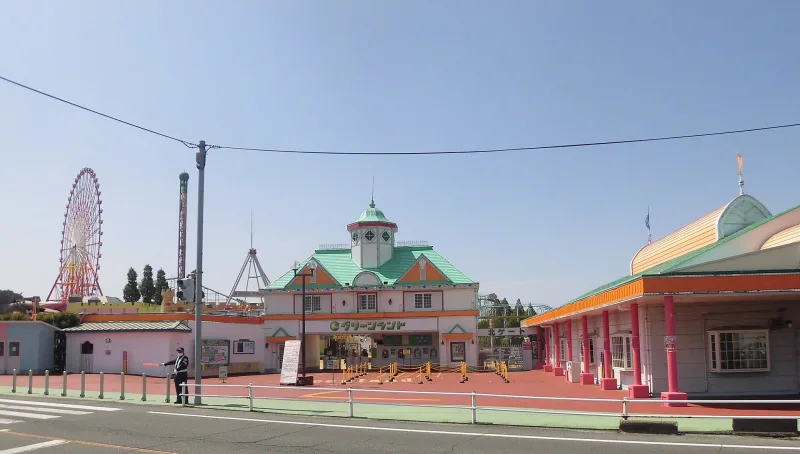 Main entrance gate of Greenland in Arao with the Ferris wheel behind