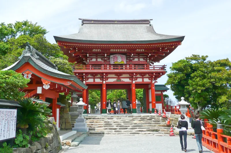 Red two-storey Romon gate on the approach to Udo Jingu
