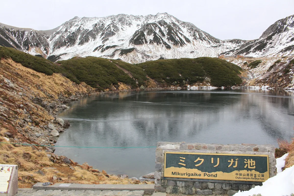Mikurigaike lake reflecting Mount Tate in Chubu-Sangaku National Park