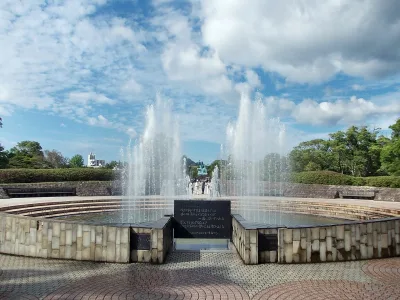 The circular Fountain of Peace with water jets in Nagasaki Peace Park