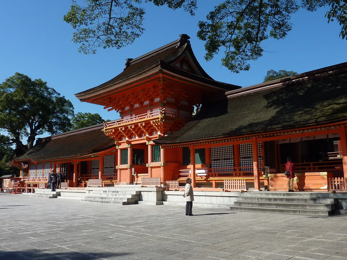 The vermilion Nanchu Romon gate and roofed corridors of Usa Jingu's upper shrine