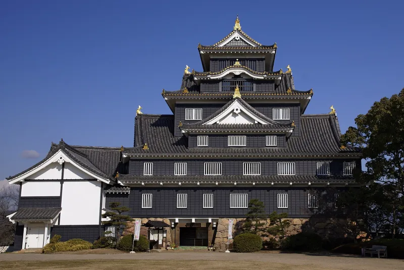 Front view of the black keep of Okayama Castle with white-trimmed windows