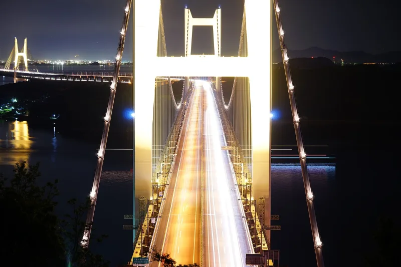 Night view of the illuminated Shimotsui-Seto Bridge seen from Mount Washu