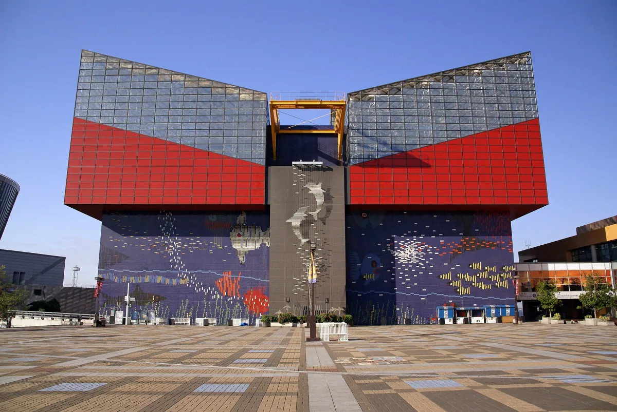 Exterior of Osaka Aquarium Kaiyukan with its red, blue and glass facade