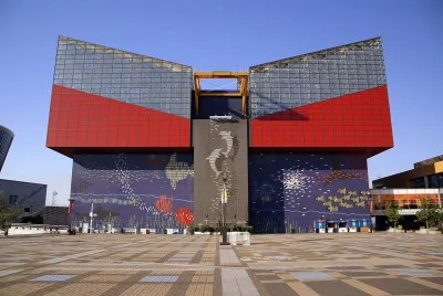 Exterior of Osaka Aquarium Kaiyukan with its red, blue and glass facade