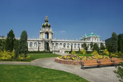 Replica of Dresden's Zwinger Palace with flower beds at Arita Porcelain Park