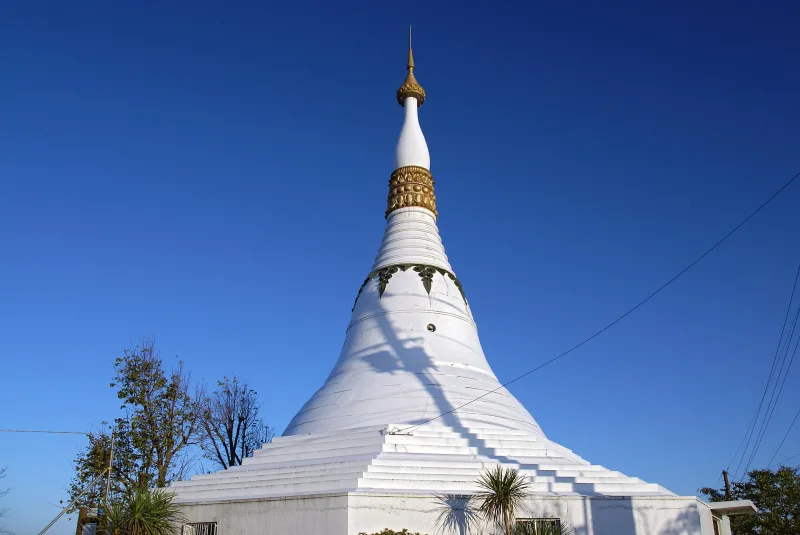 The white Burmese-style Peace Memorial Pagoda at the top of Mount Bizan