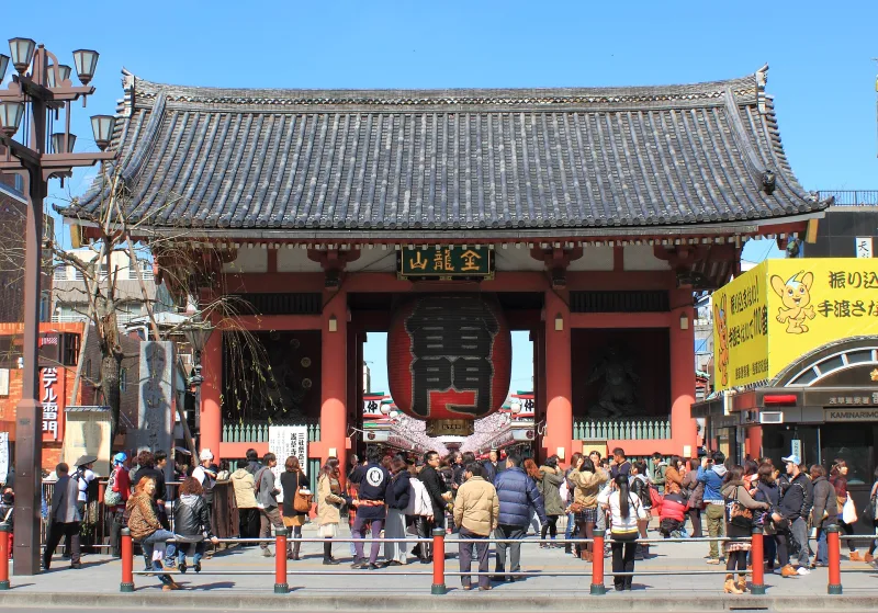 Front view of the red Kaminarimon gate with its dark tiled roof in Asakusa, Tokyo