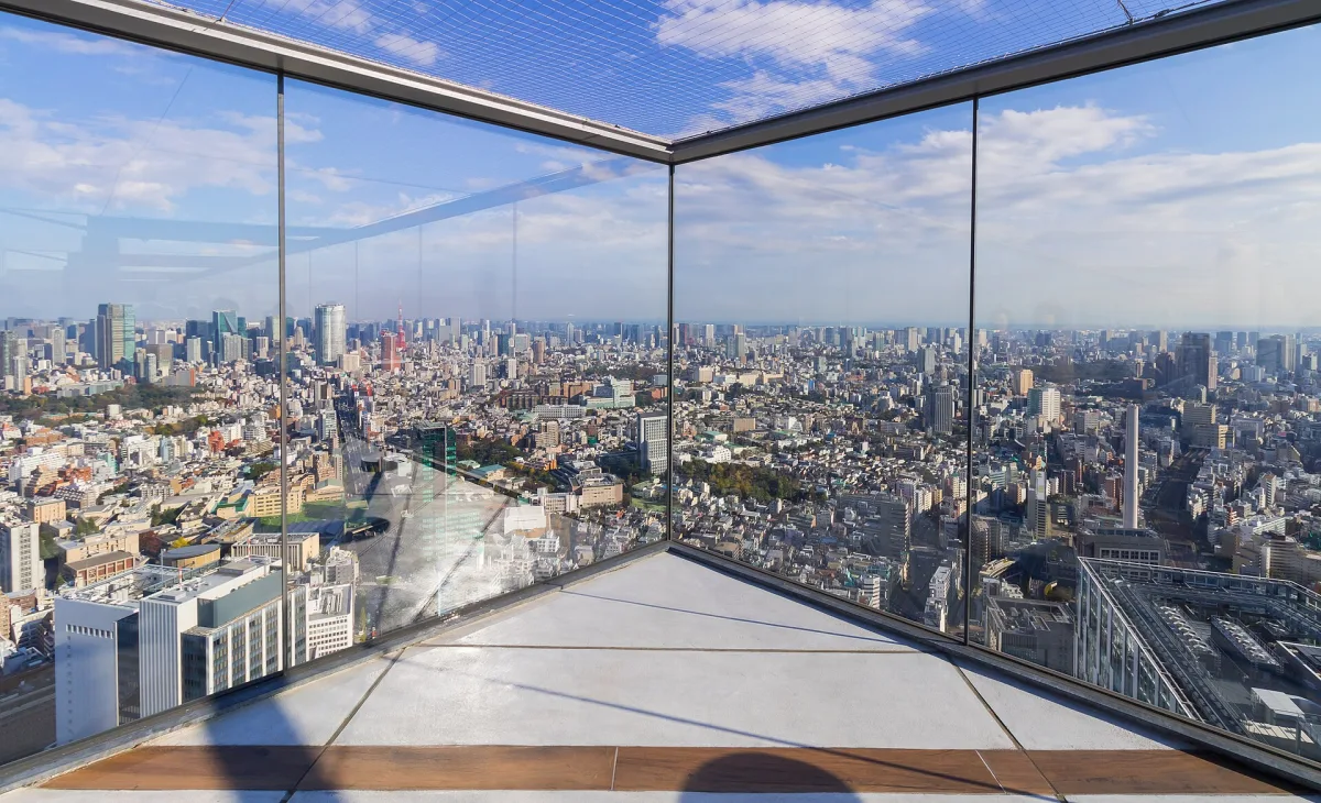 Glass-edged corner of the Shibuya Sky rooftop deck overlooking Tokyo