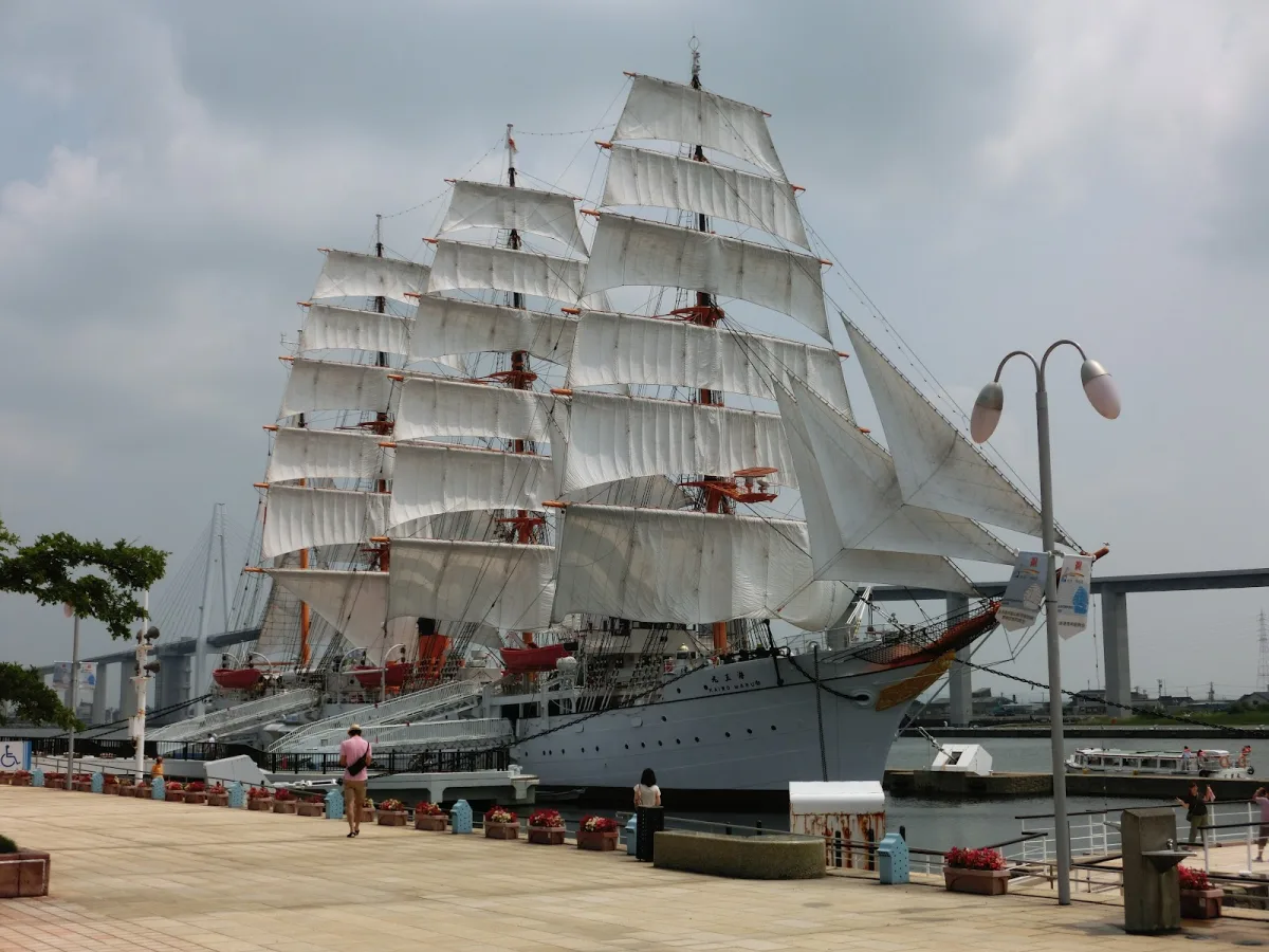The sailing ship Kaiwo Maru with all sails set at its berth in Toyama