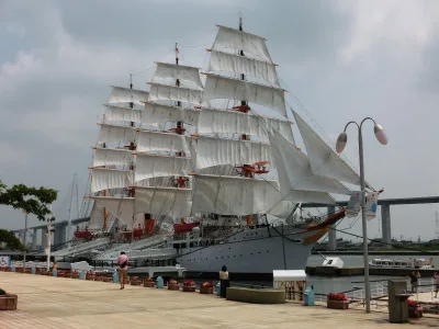 The sailing ship Kaiwo Maru with all sails set at its berth in Toyama