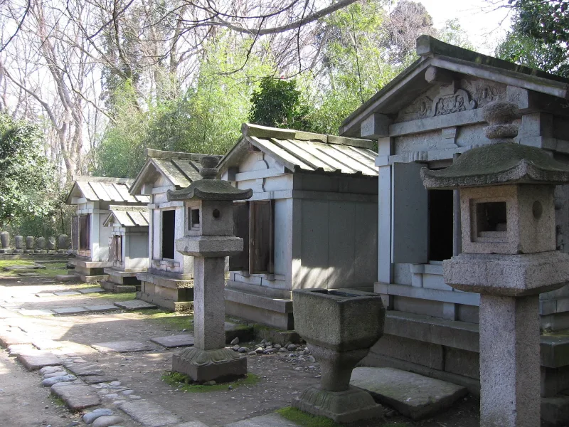 Row of small stone mausoleums of the Maeda family at Zuiryuji Temple